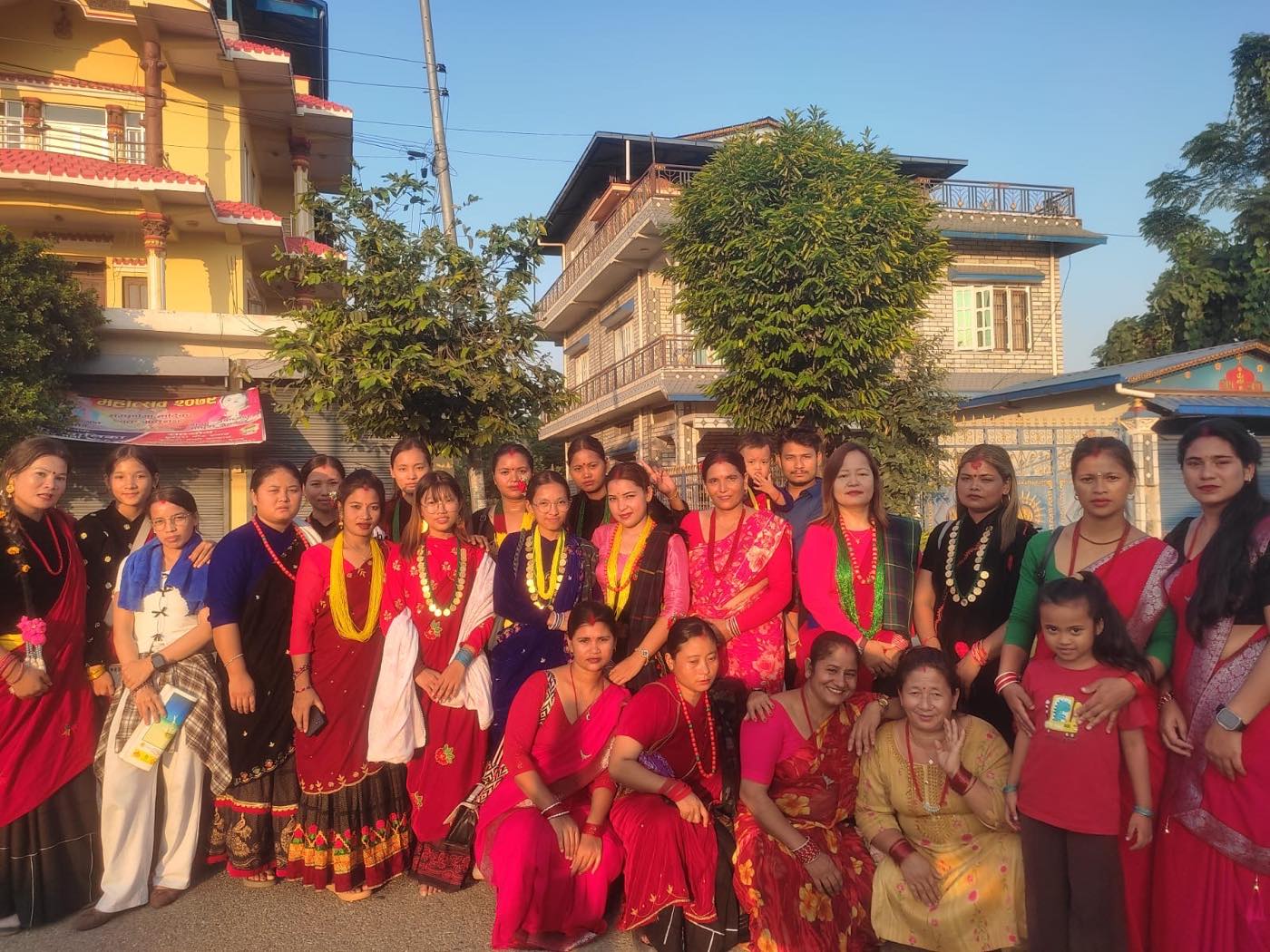 Women of the Trishakti Apparel team in traditional dress on a festival day in Gaindakot, Nepal