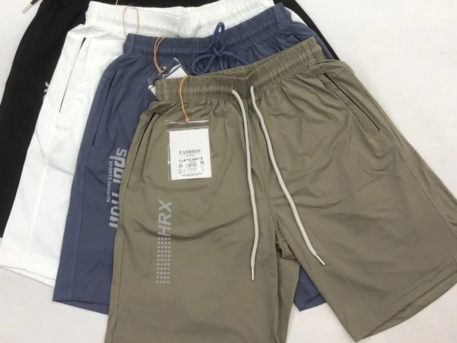 Private-label knit sport shorts in multiple colours laid flat with drawcords